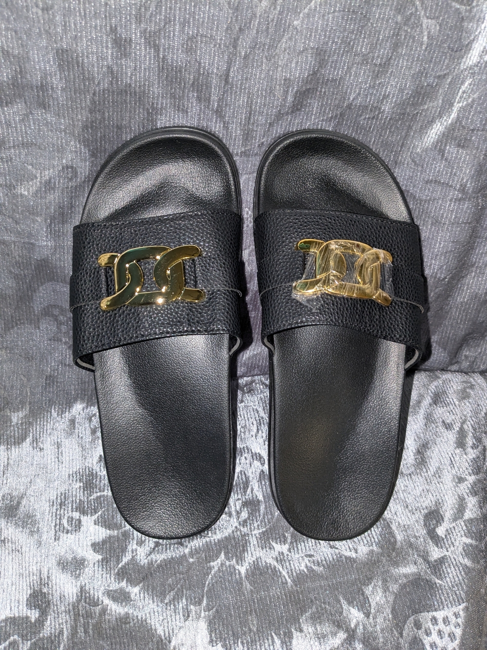 Woman's Black Slide Sandals with Gold Accent